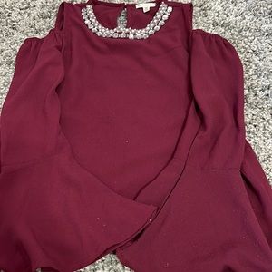 Fancy shirt with fake diamonds around the neckline. T-shirt with sparkles